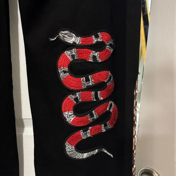 Black Wide-Leg Pants with Embroidered Designs - Picture 6 of 6